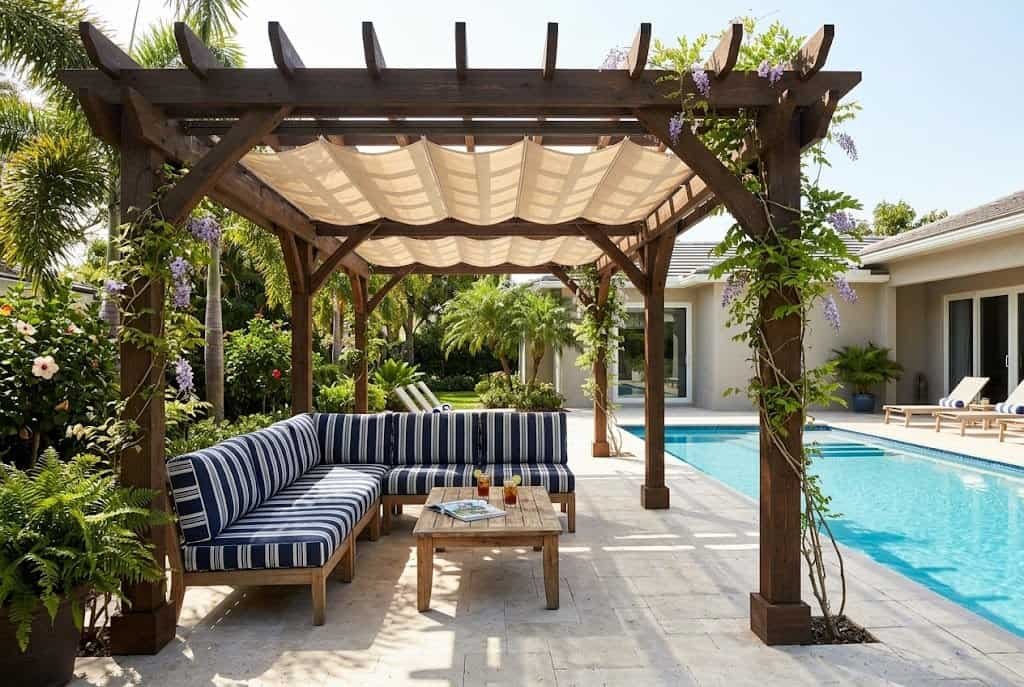 pergola and shade sail over pool deck for sun protection and style